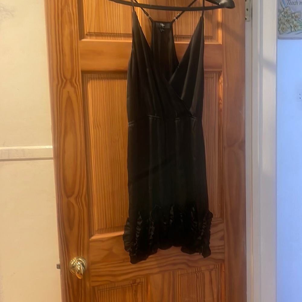 Beautiful silk black dress, ribbon lace around the bottom